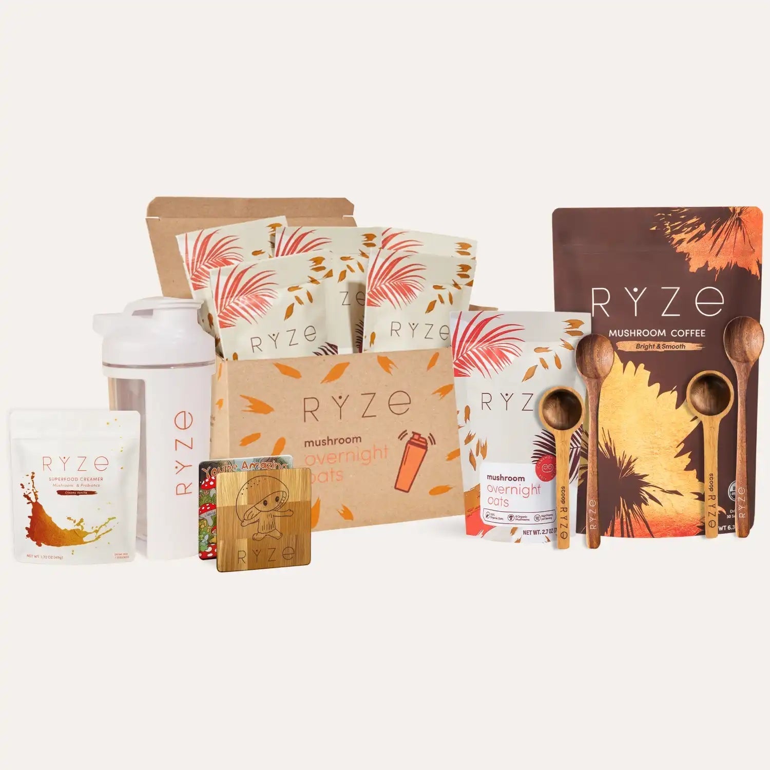 Collection of RYZE products including coffee bags, containers, and packaging on a white background